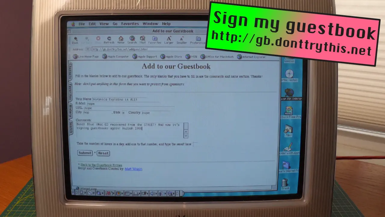 An iMac G3 showing an "add to our Guestbook" page on Internet Explorer.
<p>A graphic has been added to the image which says "sign my guestbook, http://gb.donttrythis.net"." class="wp-image-1702"><figcaption class=