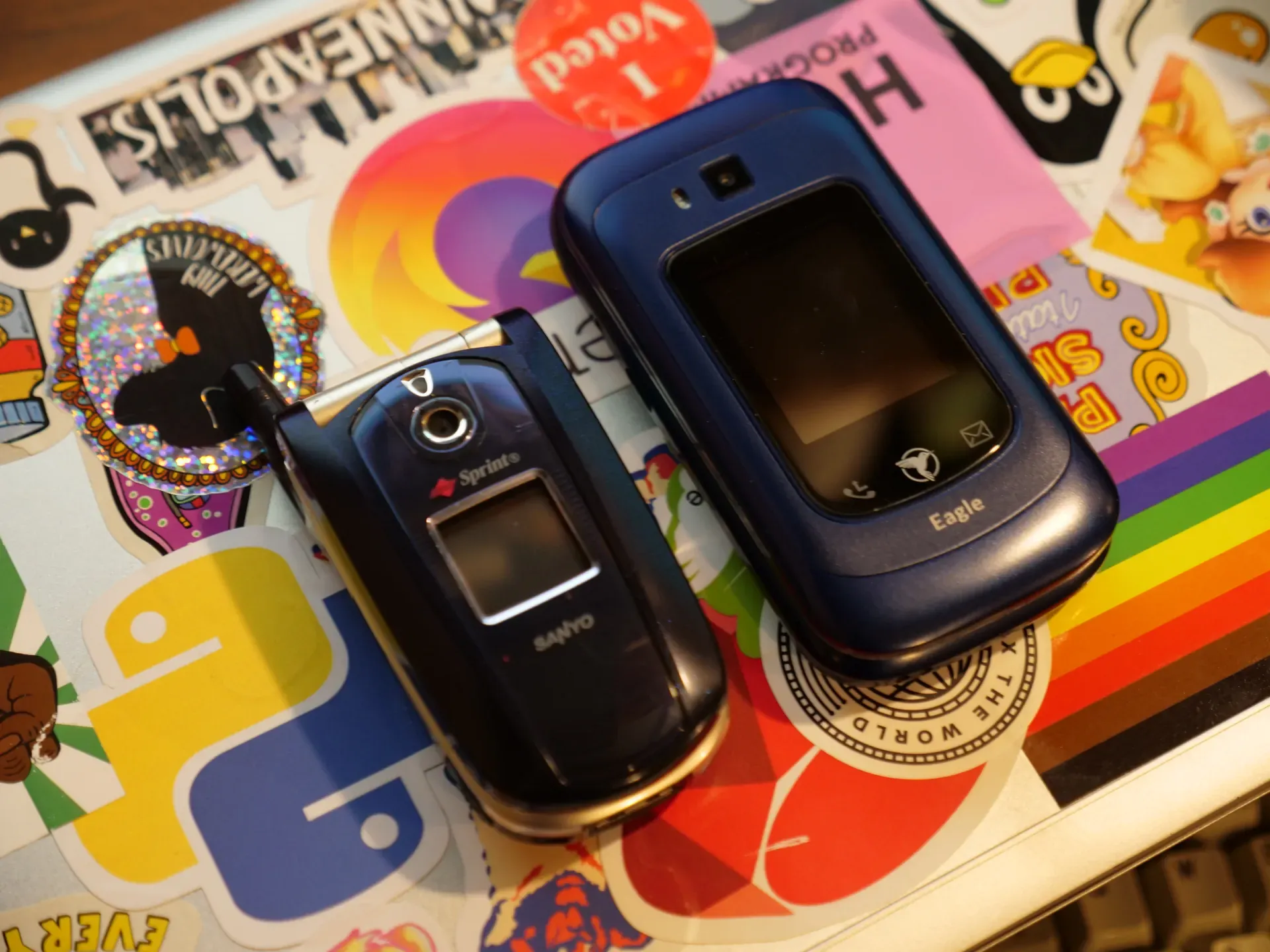 Two dumbphones: an older Sanyo on the left, which is a bit smaller than the newer Sunbeam F1 Horizon on the right.