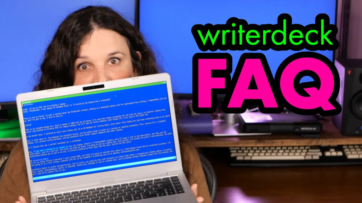 It's me, holding a laptop with a blue screen and lots of text in front of my face. The words "writerdeck FAQ" are superimposed to my side.