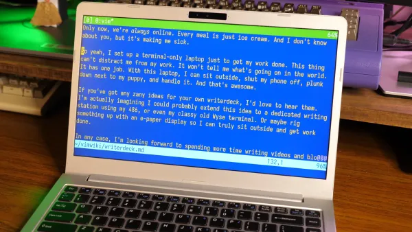 A picture of a laptop with a tty screen running vim, the screen is filled with the words from a video script.